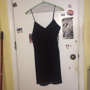 Adorable “little black dress”